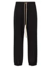Fear Of God Elastic Waistband Trackpant Joggers With Side Zip Pockets In Black