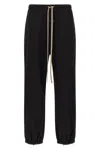Fear Of God Elastic Waistband Trackpant Joggers With Side Zip Pockets In Black