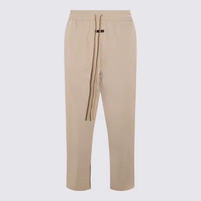 Fear Of God Trousers Cement In Brown