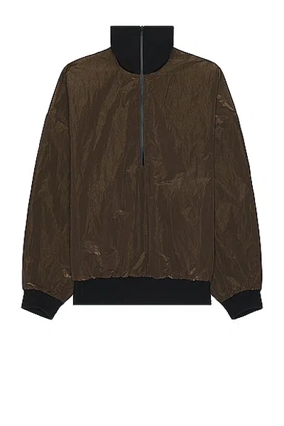 Fear Of God Wrinkled Polyester Half Zip High Neck Track Jacket In Mocha