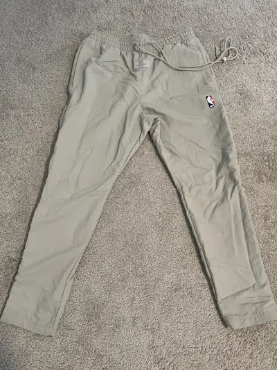 Pre-owned Fear Of God X Nike Nylon Warm Up Pants In Sand