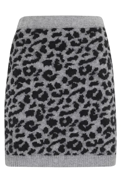FEDERICA TOSI SPOTTED KNIT MINI SKIRT WITH RIBBED HEMLINE