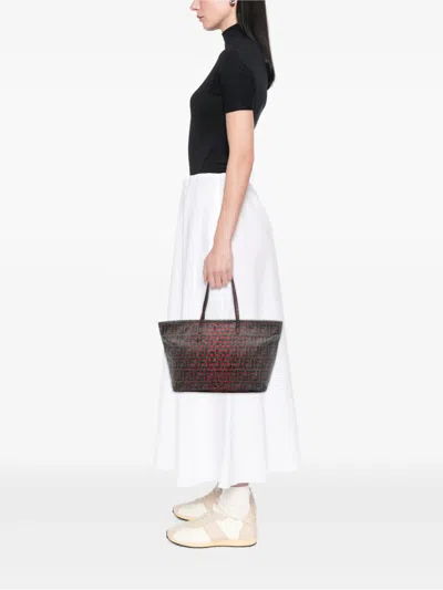 Pre-owned Fendi 2010-2025 Medium Zucca Perforated Coated Canvas Roll Tote Bag In Brown