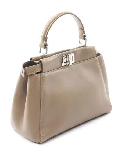 Pre-owned Fendi 2010-2025 Mini Leather Selleria Peekaboo Iconic Satchel In Brown