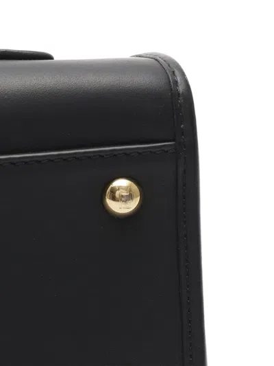 Pre-owned Fendi 2010-2025 Small Zucca Embossed Leather Runaway Satchel In Black