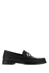 Fendi Round Toe Textured Leather Loafers In Black