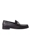 Fendi Round Toe Textured Leather Loafers In Black