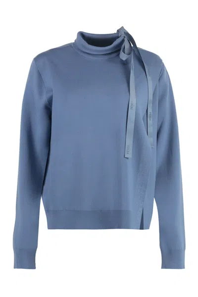 FENDI BLUE WOOL PULLOVER WITH UNIQUE CUT-OUT DETAILS AND ASYMMETRICAL SLIT FOR WOMEN'S SS23 COLLECTION