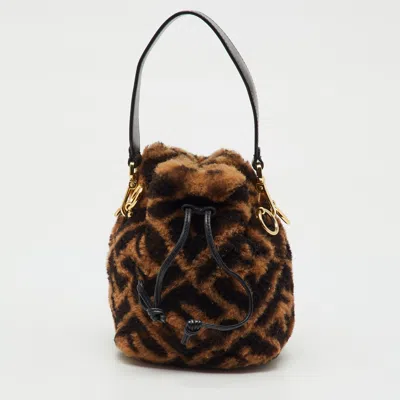 Pre-owned Fendi Brown Shearling Fur And Leather Mini Mon Tresor Drawstring Bucket Bag