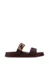 Fendi Double-band Slides With Decorative Buckle And Embossed Motif In Brown