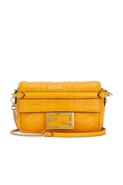 Pre-owned Fendi Ff Embossed 1974 Baguette Shoulder Bag In Orange