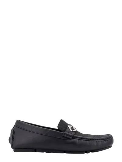 Fendi Round Toe Textured Leather Loafers In Black