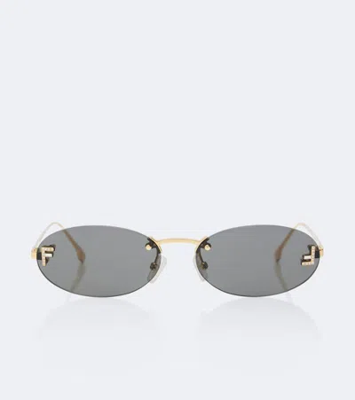 Fendi First Crystal Embellished Oval Sunglasses In Gold