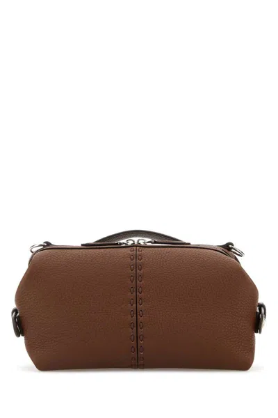 Fendi Handbags. In Brown