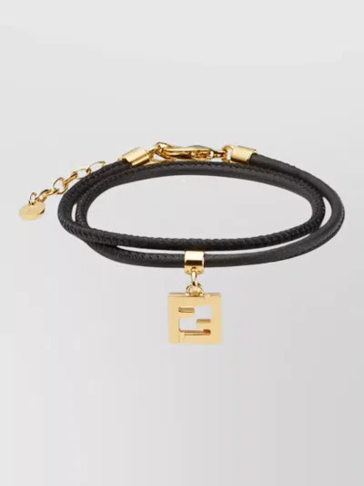 FENDI LEATHER BRACELET WITH GOLD TONE CHARM