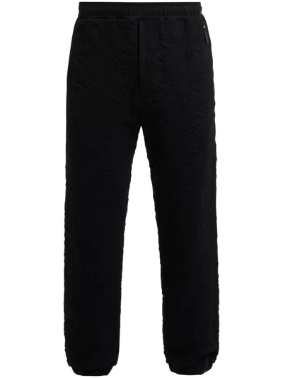 Fendi Logo-embossed Track Pants In Black