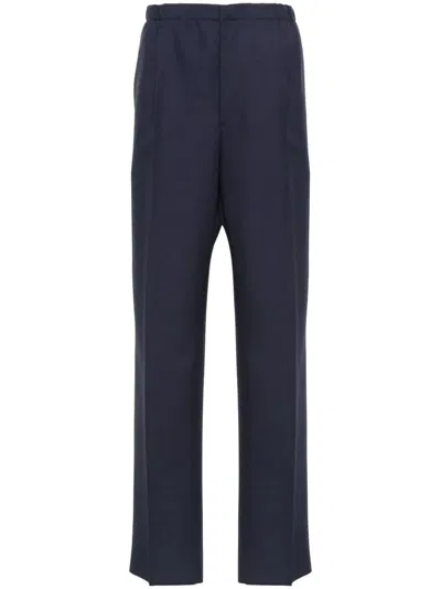FENDI MEN'S BLUE WOOL TROUSERS WITH PLEAT DETAILING FOR SS24