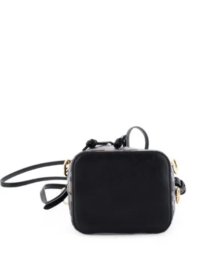 Pre-owned Fendi Mon Tresor Zucca Embossed Leather Mini Bucket Bag In Brown