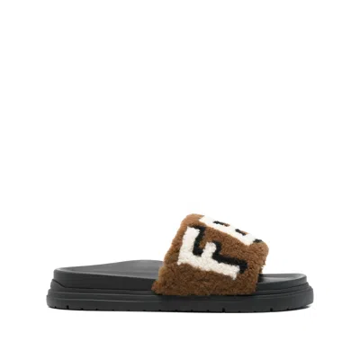 Fendi Shearling Slides In Brown