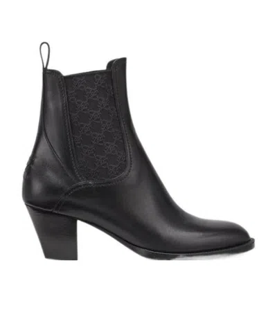 Fendi Tronchetto Ankle Boots In Black