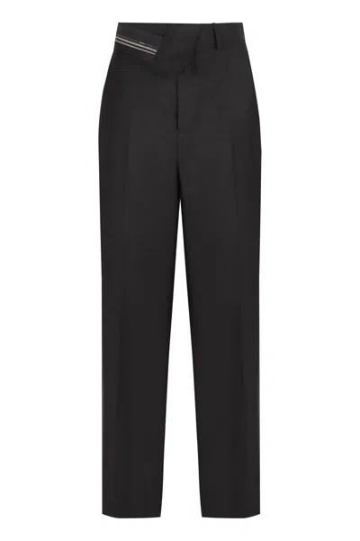 Fendi Wool Carrot-fit Trousers In Black