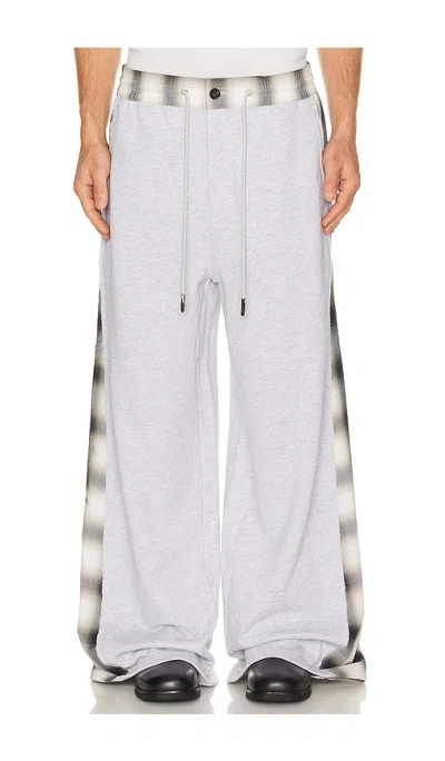 Feng Chen Wang Patched Panel Jersey Trousers In Gray