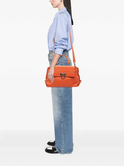 Pre-owned Ferragamo 2000-2025 Medium Leather Gancini Sofia Satchel In Orange