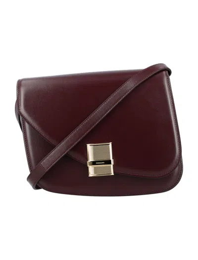 Ferragamo Adjustable Leather Crossbody Handbag For Women In Burgundy
