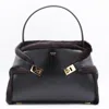 Ferragamo Hug Shearling-trimmed Leather Shoulder Bag In Black