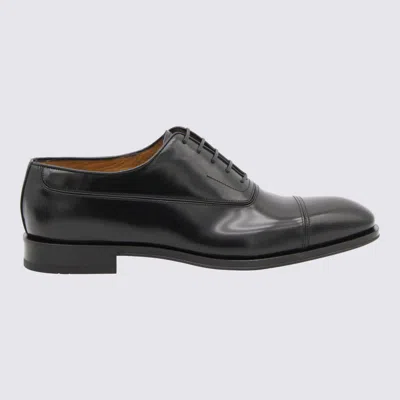 FERRAGAMO BLACK AND BROWN LEATHER LACE UP SHOES