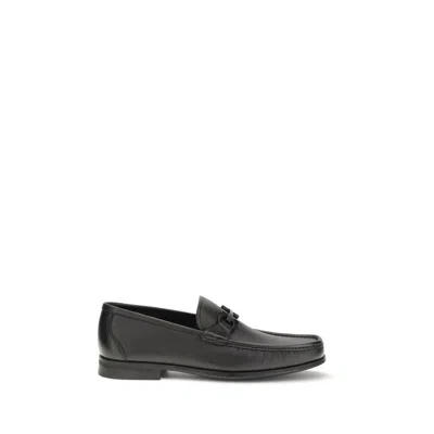 Ferragamo Black Calf Leather Bos Taurus Slip-on Loafers