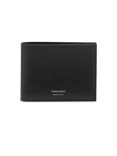 Ferragamo Florence Black Bi-fold Wallet With Logo Lettering On The Front In Leather Man