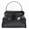 Ferragamo Hug Shearling-trimmed Leather Shoulder Bag In Black