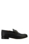 Ferragamo Black Solid Loafers In Black
