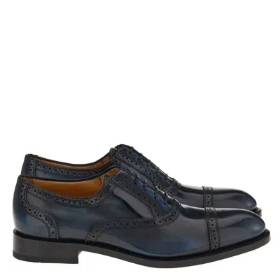 Ferragamo Cap-toe Oxford Brogue Shoes In Black