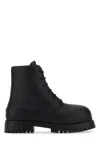 Ferragamo Rubberized Leather Combat Boots In Black