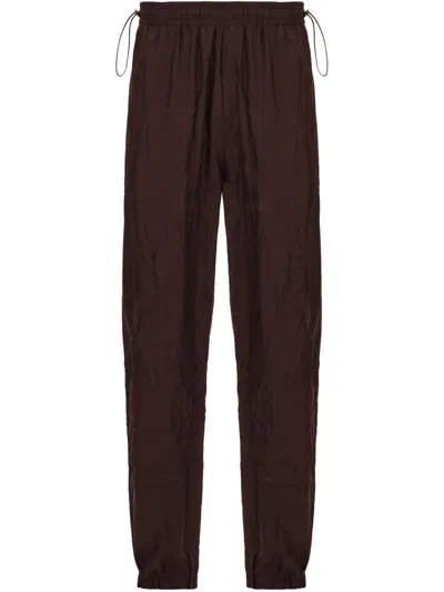 Ferragamo Crinkled Track Pants In Brown