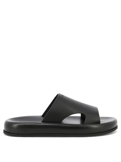 Ferragamo Logo-embossed Leather Slides In Black
