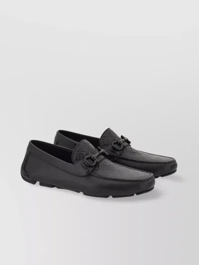 FERRAGAMO EMBOSSED MONOGRAM DRIVING LOAFERS