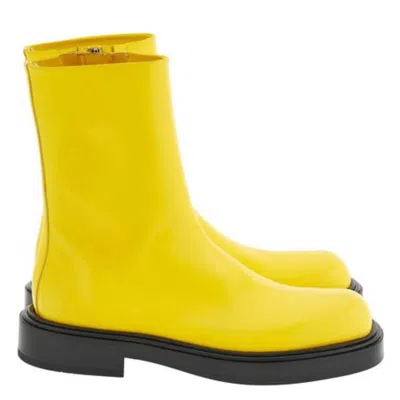 Ferragamo Formia Rounded Toe Ankle Boots In Yellow