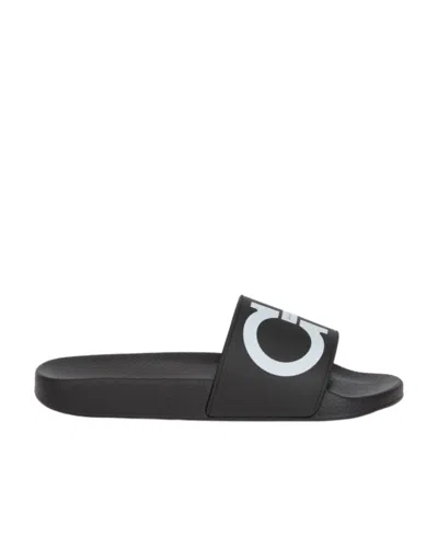 Ferragamo Front Logo Slippers In Black