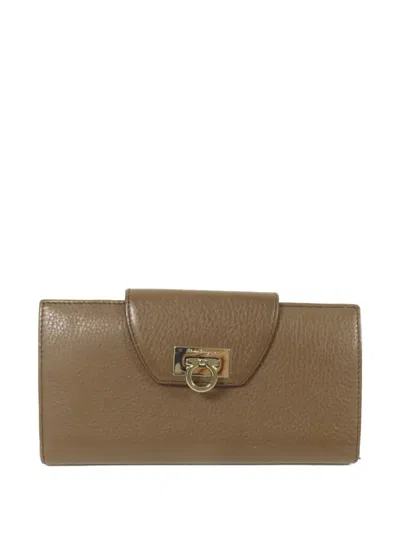 Pre-owned Ferragamo Gancini Bifold Calfskin Wallet In Brown