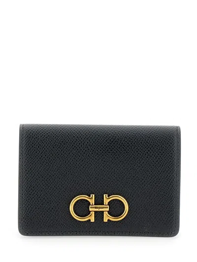 FERRAGAMO 'GANCINI' BLACK WALLET WITH BUTTON CLOSURE IN LEATHER WOMAN