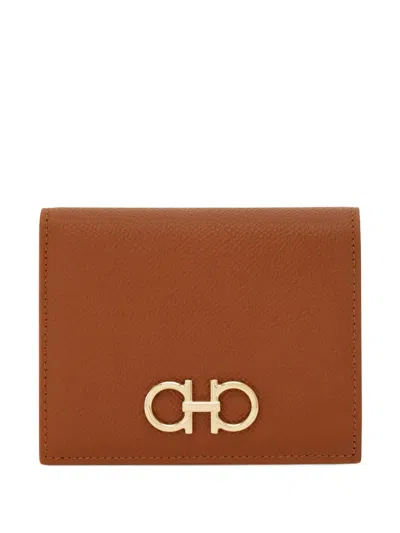 Ferragamo Gancini Buckle Compact Wallet In Brown