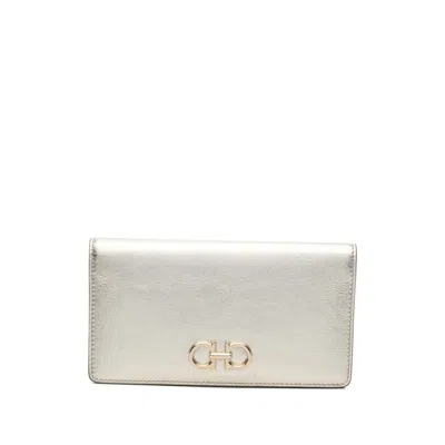 Ferragamo Gancini Buckle Continental Wallet In Gold