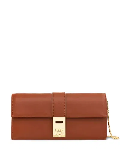 Ferragamo Gancini Clutch Bag In Brown