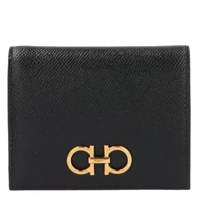 Ferragamo Gancini Compact French Wallet In ["black","gold Tone"]
