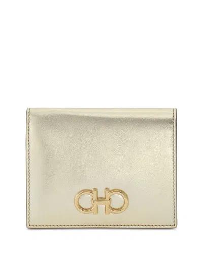 Ferragamo Gancini Compact Metallic Leather Wallet In Gold