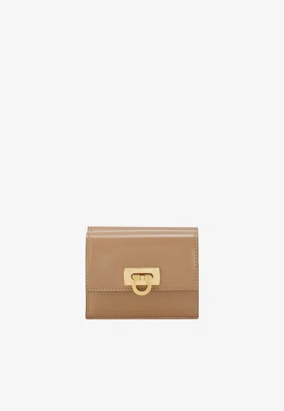 Ferragamo Gancini Compact Wallet In Beige