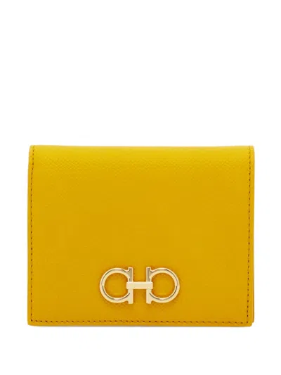 Ferragamo Gancini Compact Wallet In Gold